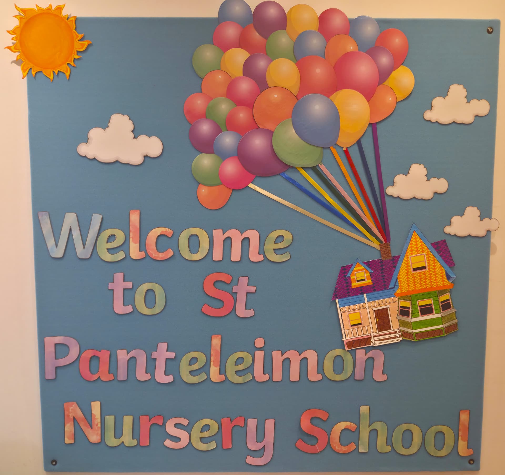A colourful welcome noticeboard at Saint Panteleimon Nursery School